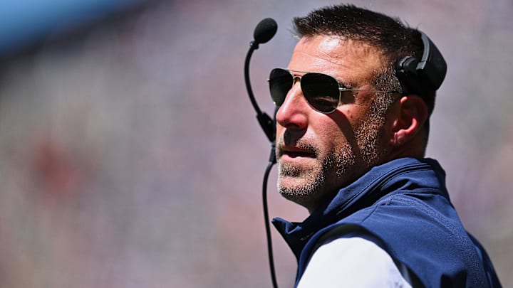Aug 12, 2023; Chicago, Illinois, USA;  Tennessee Titans Head Coach Mike Vrabel watches his team play against the Chicago Bears in the first half at Soldier Field. Mandatory Credit: Jamie Sabau-Imagn Images