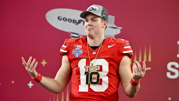 Jan 10, 2025; Arlington, TX, USA;  Ohio State Buckeyes quarterback Will Howard (18) celebrates after the Buckeyes defeat the Texas Longhorns at AT&T Stadium.