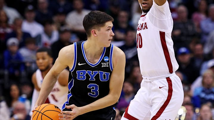 Mar 27, 2025; Newark, NJ, USA; Brigham Young Cougars guard Egor Demin (3) handles the ball against Alabama Crimson Tide forward Mouhamed Dioubate (10) during the second half during an East Regional semifinal of the 2025 NCAA tournament at Prudential Center. Mandatory Credit: Vincent Carchietta-Imagn Images