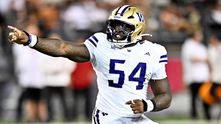Sep 20, 2025; Pullman, Washington, USA; Washington Huskies defensive lineman Anterio Thompson (54) celebrates a Washington State Cougars turnover in the second half of Apple Cup at Gesa Field at Martin Stadium. Washington Huskies won 59-24. Mandatory Credit: James Snook-Imagn Images