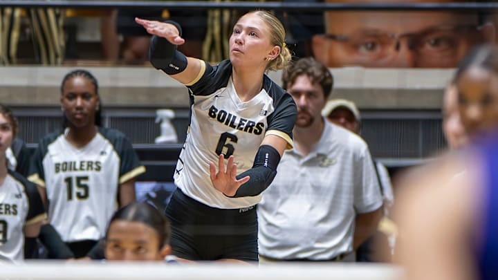 Purdue Freshman Sienna Foster (6) serves during a match between Washington and Purdue. Purdue Freshman Sienna Foster (6) serves during a match between Washington and Purdue.