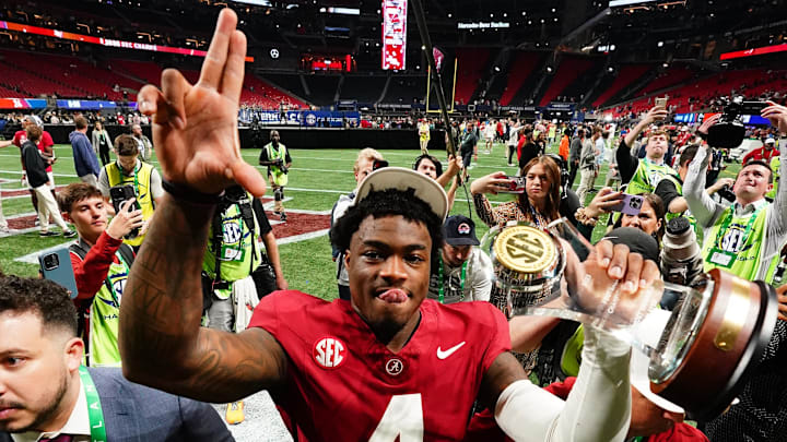 Dec 2, 2023; Atlanta, GA, USA; Alabama Crimson Tide quarterback Jalen Milroe (4) leaves the field after defeating the Georgia Bulldogs in the SEC Championship at Mercedes-Benz Stadium. Mandatory Credit: John David Mercer-Imagn Images