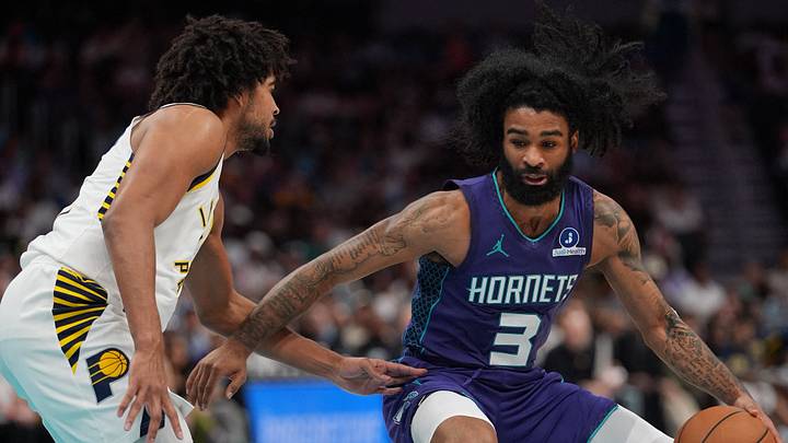 Charlotte Hornets guard Coby White (3) handles the ball against Indiana Pacers guard Ethan Thompson Charlotte Hornets guard Coby White (3) handles the ball against Indiana Pacers guard Ethan Thompson