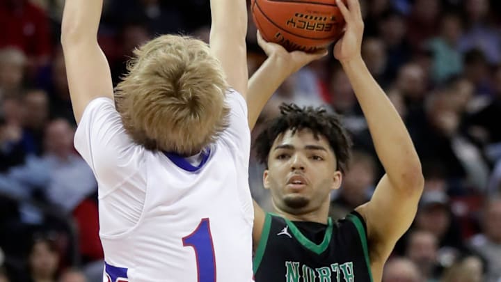 Oshkosh North High School's Xzavion Mitchell (2) puts up a shot during a WIAA Division 1 state boys basketball tournament semifinal game. Wm. Glasheen USA TODAY NETWORK-Wisconsin