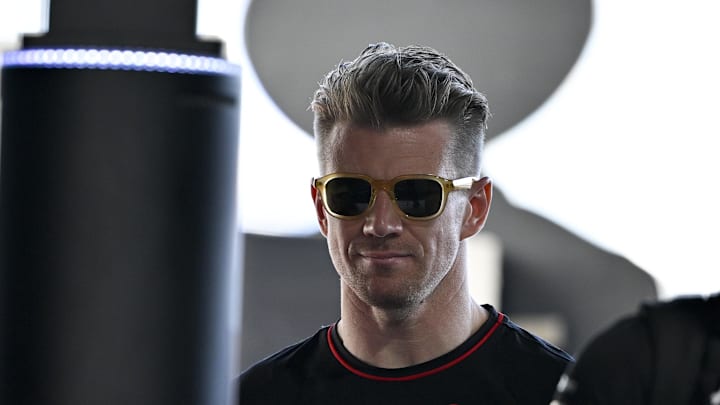 Oct 20, 2024; Austin, Texas, USA; Moneygram Haas F1 Team driver Nico Hulkenberg (27) of Team Germany walks through the track entrance before the 2024 Formula One US Grand Prix at Circuit of the Americas. Mandatory Credit: Jerome Miron-Imagn Images