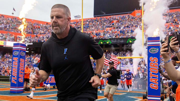 Florida Gators head coach Billy Napier runs onto the field before the start of the game at Ben Hill Griffin Stadium in Gainesville, FL on Saturday, September 7, 2024 against the Samford Bulldogs. The Gators won 45-7. [Doug Engle/Gainesville Sun]
