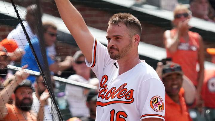 Jul 28, 2022; Baltimore, Maryland, USA; Baltimore Orioles designated hitter Trey Mancini (16) takes a curtain call following his two-run, inside-the-park home run in the eighth inning against the Tampa Bay Rays at Oriole Park at Camden Yards. Mandatory Credit: Mitch Stringer-USA TODAY Sports
