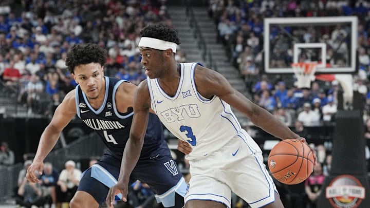 Nov 3, 2025; Las Vegas, Nevada, USA; BYU Cougars forward AJ Dybantsa (3) drives past Villanova Wildcats guard Tyler Perkins (4) during the first half of the Hall of Fame Series game at T-Mobile Arena. Mandatory Credit: Candice Ward-Imagn Images