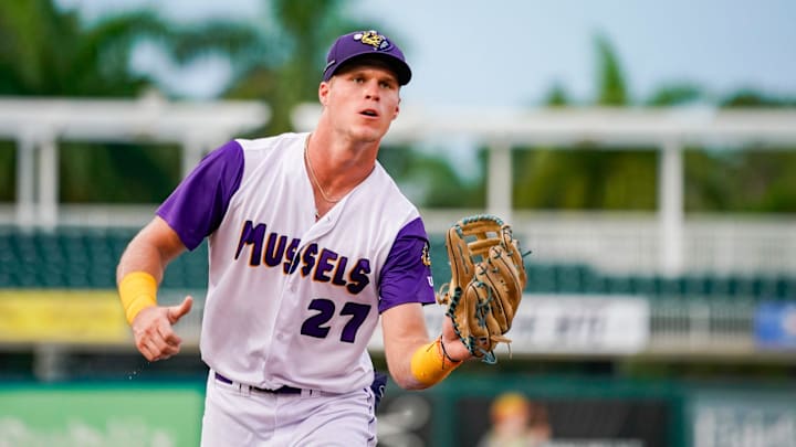 Fort Myers Mighty Mussels outfielder Walker Jenkins (27) catches a ball from the dugout during the second inning of a game against the Tampa Tarpons at Hammond Stadium in Fort Myers on Friday, June 28, 2024.