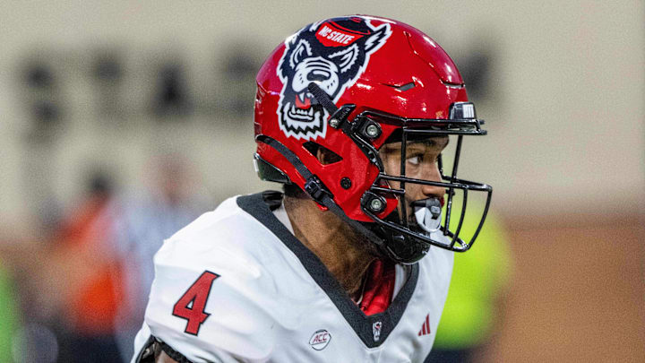 Sep 11, 2025; Winston-Salem, North Carolina, USA;  North Carolina State Wolfpack running back Jayden Scott (4) returns a kick in the first half against the Wake Forest Demon Deacons at Allegacy Federal Credit Union Stadium. Mandatory Credit: Luke Jamroz-Imagn Images