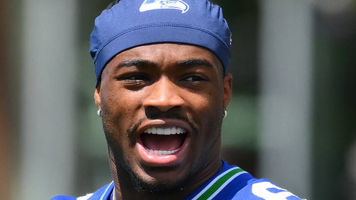Seattle Seahawks quarterback Jalen Milroe laughs