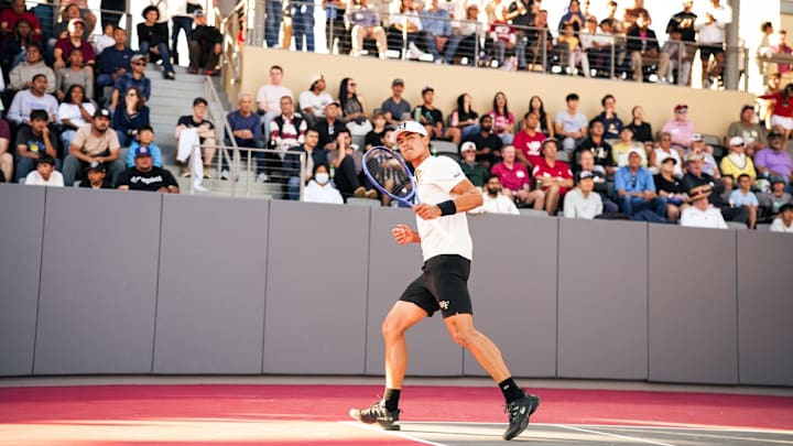 Wake Forest men's tennis player Andrew Delgado competes against Stanford