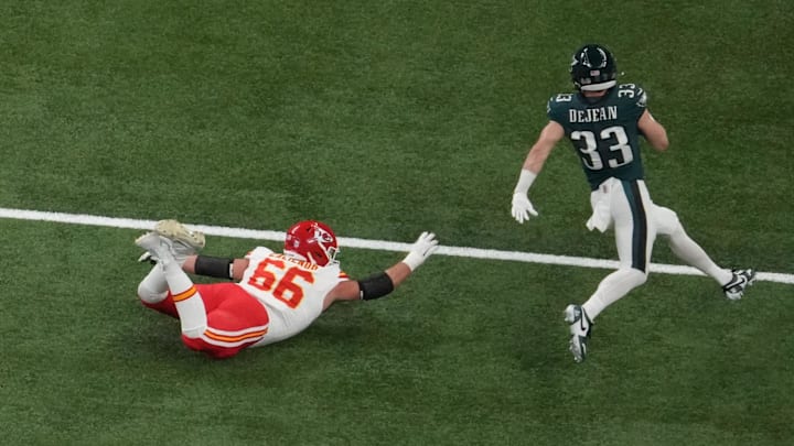 Philadelphia Eagles cornerback Cooper DeJean intercepts a pass as Kansas City Chiefs guard Mike Caliendo attempts to make the tackle in the second quarter during Super Bowl LIX.