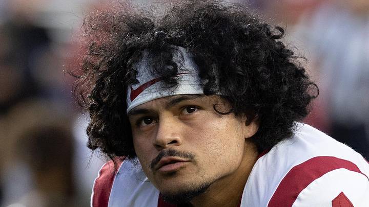 Oct 24, 2026; Madison, Wisconsin, USA; USC Trojans quarterback Jayden Maiava (14) stretches during warmups before the game against the Wisconsin Badgers at Camp Randall Stadium. Oct 24, 2026; Madison, Wisconsin, USA; USC Trojans quarterback Jayden Maiava (14) stretches during warmups before the game against the Wisconsin Badgers at Camp Randall Stadium.