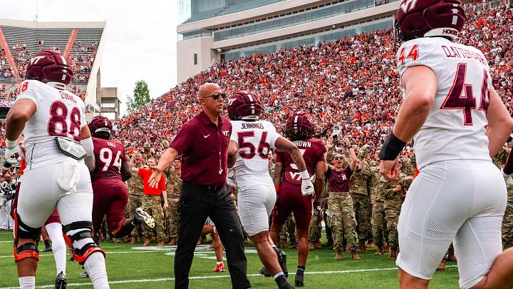 Blacksburg, VA — James Franklin standing at the exit of the tunnel during Enter Sandman. Spring game, 2026.