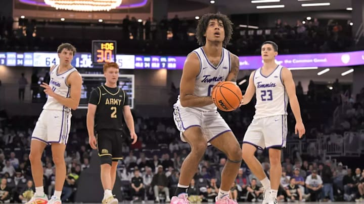 Isaiah Johnson-Arigu attempting a free throw during St. Thomas' home opener against Army.