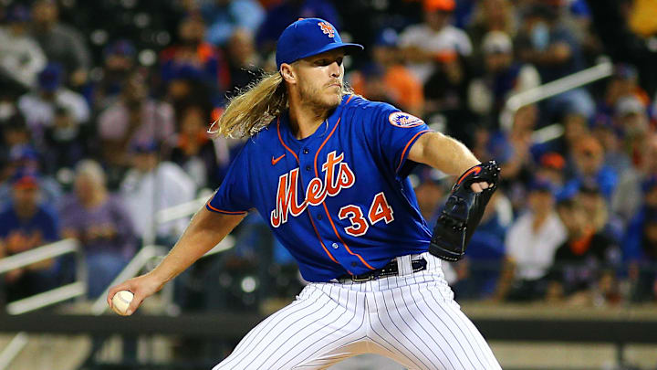 Sep 28, 2021; New York City, New York, USA; New York Mets starting pitcher Noah Syndergaard (34) throws against the Miami Marlins during the first inning of game two of a doubleheader at Citi Field. Mandatory Credit: Andy Marlin-Imagn Images