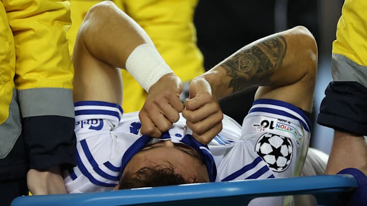 Rodrigo Huescas left the pitch in tears after injuring his knee.
