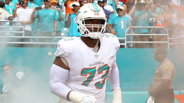  Miami Dolphins offensive tackle Austin Jackson (73) takes on the field prior the game against the Atlanta Falcons at Hard Rock Stadium in a 2021 game.
