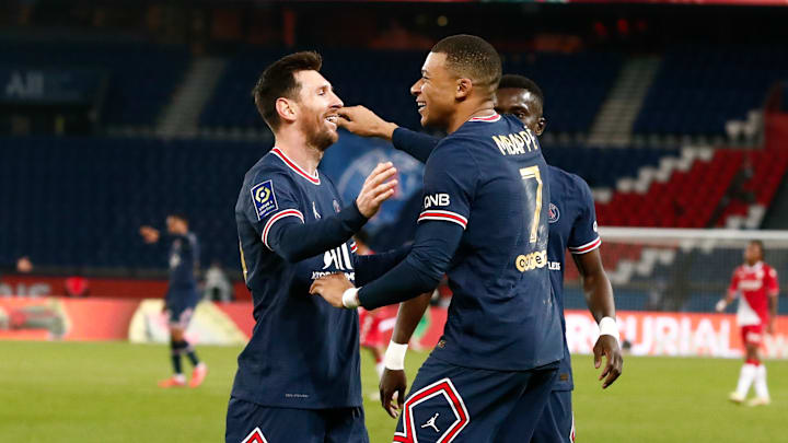 Messi con Mbappe