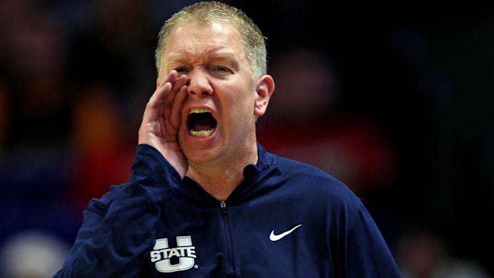 Utah State Aggies head coach Jerrod Calhoun calls to his team during the first half against the UCLA Bruins in the first round of the NCAA Tournament at Rupp Arena. Mandatory Credit: Aaron Doster-Imagn Images