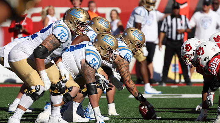 Sep 23, 2023; Salt Lake City, Utah, USA; UCLA Bruins offense lines up against the Utah Utes defense in the fourth quarter at Rice-Eccles Stadium. Mandatory Credit: Rob Gray-Imagn Images Sep 23, 2023; Salt Lake City, Utah, USA; UCLA Bruins offense lines up against the Utah Utes defense in the fourth quarter at Rice-Eccles Stadium. Mandatory Credit: Rob Gray-Imagn Images
