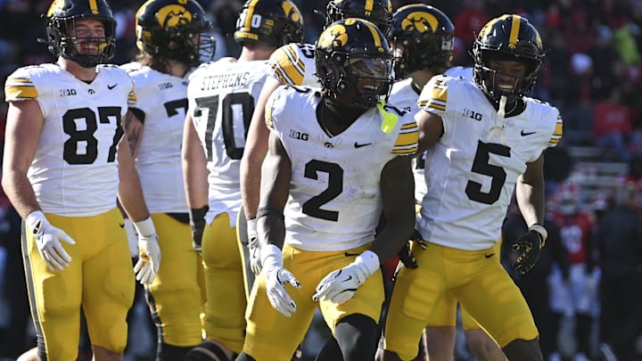 Nov 23, 2024; College Park, Maryland, USA;  Iowa Hawkeyes running back Kaleb Johnson (2) celebrates after scoring a touchdown during the first half against the Maryland Terrapins at SECU Stadium. Mandatory Credit: Tommy Gilligan-Imagn Images