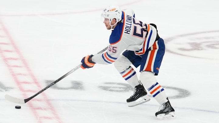 May 31, 2024; Dallas, Texas, USA; Edmonton Oilers left wing Dylan Holloway (55) in action against the Dallas Stars during the third period between the Dallas Stars and the Edmonton Oilers in game five of the Western Conference Final of the 2024 Stanley Cup Playoffs at American Airlines Center. Mandatory Credit: Chris Jones-Imagn Images
