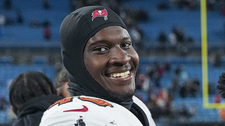Dec 1, 2024; Charlotte, North Carolina, USA;Tampa Bay Buccaneers linebacker Chris Braswell (43) and Carolina Panthers quarterback Bryce Young (9) after the overtime game at Bank of America Stadium. Mandatory Credit: Jim Dedmon-Imagn Images Dec 1, 2024; Charlotte, North Carolina, USA;Tampa Bay Buccaneers linebacker Chris Braswell (43) and Carolina Panthers quarterback Bryce Young (9) after the overtime game at Bank of America Stadium. Mandatory Credit: Jim Dedmon-Imagn Images