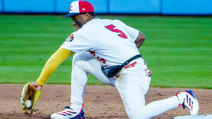 Peoria shortstop Jesús Baéz backhands a tough throw to second for a force out against South Bend during the Chiefs' home opener Tuesday, April 7, 2026 at Dozer Park in Peoria. The Chiefs routed the Cubs 10-1. Peoria shortstop Jesús Baéz backhands a tough throw to second for a force out against South Bend during the Chiefs' home opener Tuesday, April 7, 2026 at Dozer Park in Peoria. The Chiefs routed the Cubs 10-1.