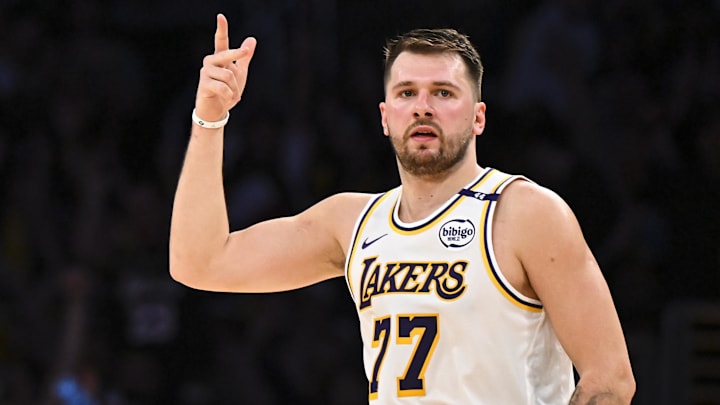 Mar 22, 2025; Los Angeles, California, USA; Los Angeles Lakers guard Luka Doncic (77) reacts after scoring against Chicago Bulls during the first half at Crypto.com Arena. Mandatory Credit: Jonathan Hui-Imagn Images Mar 22, 2025; Los Angeles, California, USA; Los Angeles Lakers guard Luka Doncic (77) reacts after scoring against Chicago Bulls during the first half at Crypto.com Arena. Mandatory Credit: Jonathan Hui-Imagn Images