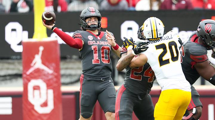 Nov 22, 2025; Norman, Oklahoma, USA;  Oklahoma Sooners quarterback John Mateer (10) throws during the second quarter against the Missouri Tigers at Gaylord Family-Oklahoma Memorial Stadium. Mandatory Credit: Kevin Jairaj-Imagn Images