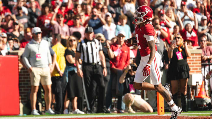 Nov 16, 2024; Tuscaloosa, Alabama, USA; Alabama Crimson Tide wide receiver Ryan Williams (2) scores a touchdown against the Mercer Bears during the first quarter at Bryant-Denny Stadium. Mandatory Credit: Will McLelland-Imagn Images Nov 16, 2024; Tuscaloosa, Alabama, USA; Alabama Crimson Tide wide receiver Ryan Williams (2) scores a touchdown against the Mercer Bears during the first quarter at Bryant-Denny Stadium. Mandatory Credit: Will McLelland-Imagn Images