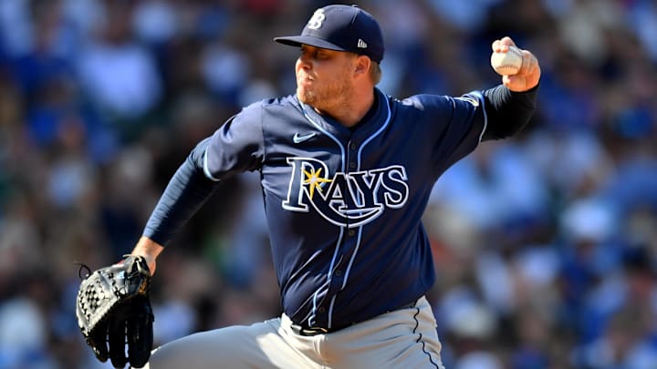 Sep 13, 2025; Chicago, Illinois, USA; Tampa Bay Rays pitcher Garrett Cleavinger (60) pitches against the Chicago Cubs during a game at Wrigley Field. Sep 13, 2025; Chicago, Illinois, USA; Tampa Bay Rays pitcher Garrett Cleavinger (60) pitches against the Chicago Cubs during a game at Wrigley Field.
