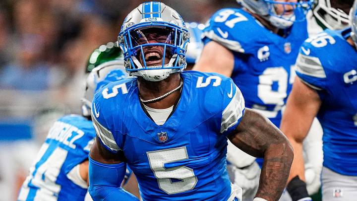 Detroit Lions defensive back Christian Izien (5) celebrates a play against New York Jets during the first half at Ford Field in Detroit on Sunday, Sept. 27, 2026.