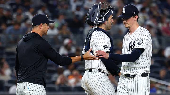 Sep 10, 2026; Bronx, New York, USA; New York Yankees pitcher Max Fried (54) hands the ball to manager Aaron Boone (17) after being pulled in the fourth inning against the Colorado Rockies at Yankee Stadium. Mandatory Credit: Vincent Carchietta-Imagn Images Sep 10, 2026; Bronx, New York, USA; New York Yankees pitcher Max Fried (54) hands the ball to manager Aaron Boone (17) after being pulled in the fourth inning against the Colorado Rockies at Yankee Stadium. Mandatory Credit: Vincent Carchietta-Imagn Images