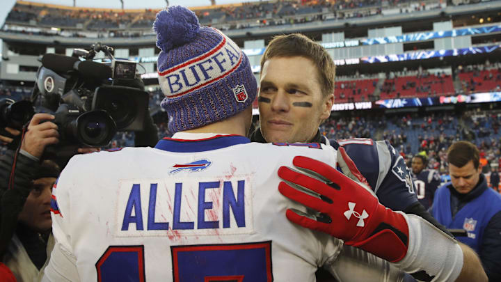 Dec 23, 2018; Foxborough, MA, USA; New England Patriots quarterback Tom Brady (12) meets Buffalo Bills quarterback Josh Allen (17) after the game at Gillette Stadium.