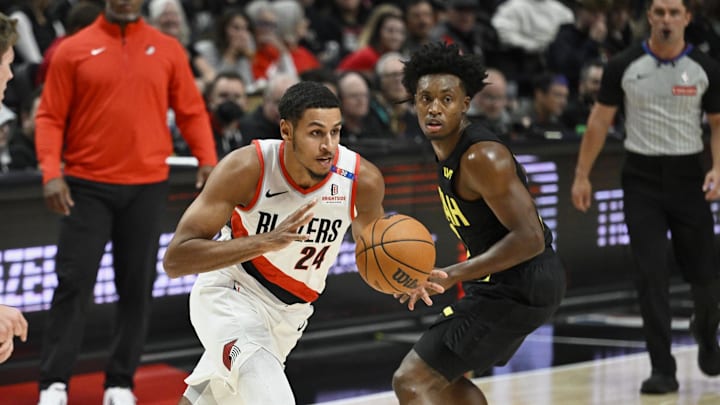 Oct 18, 2024; Portland, Oregon, USA; Portland Trail Blazers forward Kris Murray (24) drives to the basket during the second half against Utah Jazz guard Collin Sexton (2) at Moda Center. Mandatory Credit: Troy Wayrynen-Imagn Images Oct 18, 2024; Portland, Oregon, USA; Portland Trail Blazers forward Kris Murray (24) drives to the basket during the second half against Utah Jazz guard Collin Sexton (2) at Moda Center. Mandatory Credit: Troy Wayrynen-Imagn Images