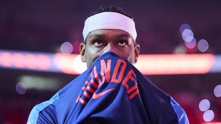Jan 26, 2025; Portland, Oregon, USA; Oklahoma City Thunder guard Shai Gilgeous-Alexander (2) covers his face during introductions before a game against the Portland Trail Blazers at Moda Center. Mandatory Credit: Troy Wayrynen-Imagn Images Jan 26, 2025; Portland, Oregon, USA; Oklahoma City Thunder guard Shai Gilgeous-Alexander (2) covers his face during introductions before a game against the Portland Trail Blazers at Moda Center. Mandatory Credit: Troy Wayrynen-Imagn Images