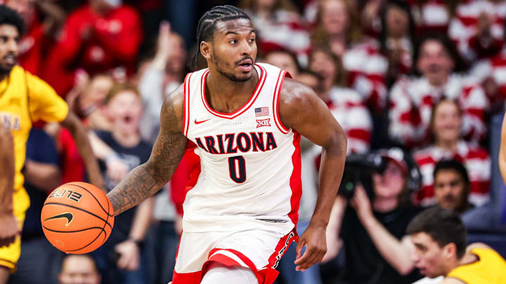 Jan 14, 2026; Tucson, Arizona, USA; Arizona Wildcats guard Jaden Bradley (0) dribbles the ball during the second half of the game against the Arizona State Sun Devils at McKale Memorial Center. Mandatory Credit: Aryanna Frank-Imagn Images