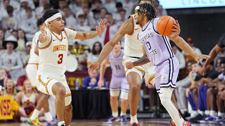 Iowa State Cyclones guard Tamin Lipsey (3) defends as Kansas State Wildcats' guard Dug McDaniel (0) looks for pass the ball during the second half in the Big-12 men’s basketball showdown at Hilton Coliseum on Feb 1, 2025 in Ames, Iowa.