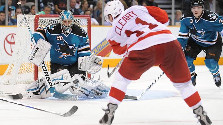 Oct. 30, 2008; San Jose, CA, USA; Detroit Red Wings right wing Dan Cleary (11) shoots on San Jose Sharks goaltender Evgeni Nabokov (20) during the third period at HP Pavilion in San Jose, CA. The Sharks defeated the Red Wings 4-2. Mandatory Credit: Kyle Terada-USA TODAY Sports