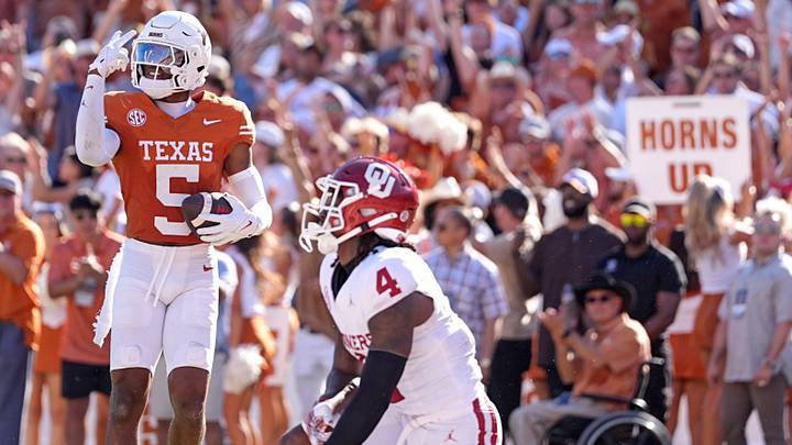 Texas Longhorns defensive back celebrates an interception.
