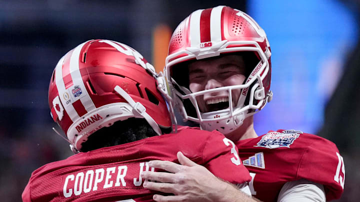 Former Indiana QB Fernando Mendoza celebrates with Indiana WR Omar Cooper Jr. Former Indiana QB Fernando Mendoza celebrates with Indiana WR Omar Cooper Jr.