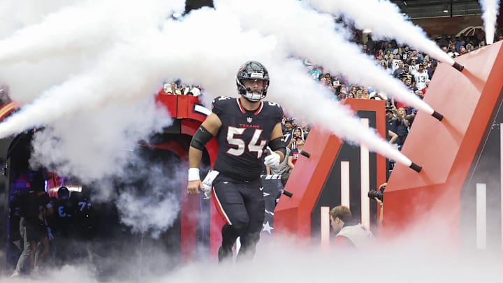 Dec 15, 2024; Houston Texans center Jarrett Patterson (54) runs onto the field before the game against the Miami Dolphins at NRG Stadium. Mandatory Credit: Troy Taormina-Imagn Images