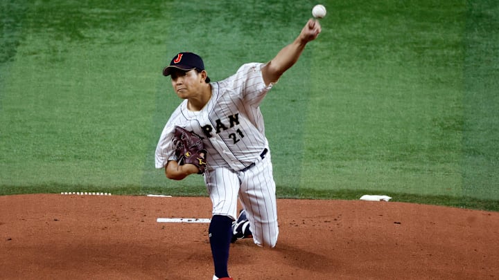 Mar 21, 2023; Miami, Florida, USA; Japan starting pitcher Shota Imanaga (21) pitches against the USA
