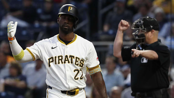 Sep 25, 2024; Pittsburgh, Pennsylvania, USA;  Pittsburgh Pirates designated hitter Andrew McCutchen (22) reacts to being called out on strikes on a check swing appeal by the Milwaukee Brewers during the second inning at PNC Park. Mandatory Credit: Charles LeClaire-Imagn Images