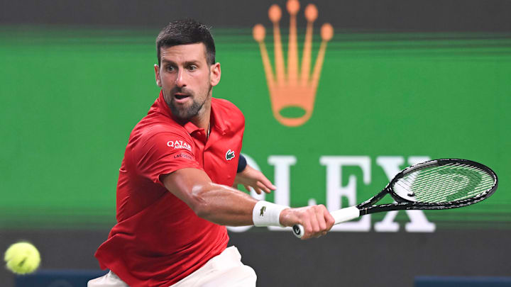Novak Djokovic overcame brutal weather conditions in his match against Jaume Munar at the Shanghai Masters.
