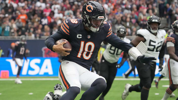 Caleb Williams scurries for a first down on a zone read play to keep alive a Bears drive in a 35-16 win over Jacksonville.