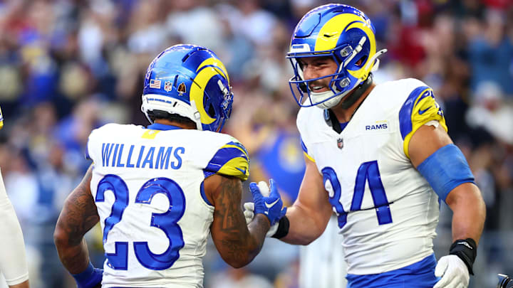 Dec 7, 2025; Glendale, Arizona, USA; Los Angeles Rams running back Kyren Williams (23) reacts with tight end Colby Parkinson (84) after scoring a touchdown during the first half at State Farm Stadium. Dec 7, 2025; Glendale, Arizona, USA; Los Angeles Rams running back Kyren Williams (23) reacts with tight end Colby Parkinson (84) after scoring a touchdown during the first half at State Farm Stadium.